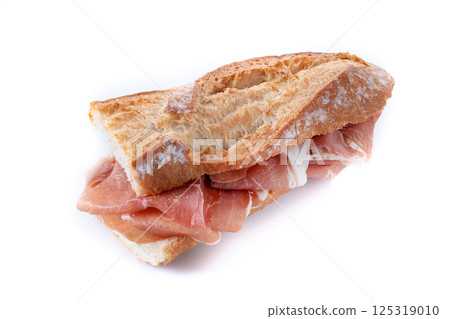 Spanish serrano ham sandwich isolated on white background. Spanish bocadillo de jamon serrano 125319010