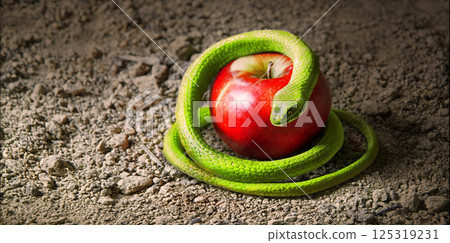 A snake wrapped around an apple as a symbol of temptation A snake wrapped around an apple as a symbol of temptation 125319231