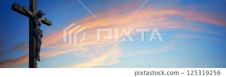 Crucified Christ hangs on the cross Crucified Christ hangs on the cross 125319256