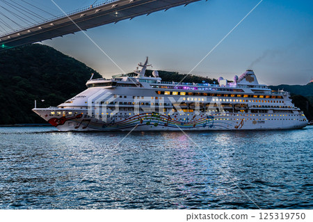 Nagasaki Port Cruise Ship Departure (Blue Dream Melody) Evening View of the Megami Bridge [Nagasaki City] 125319750