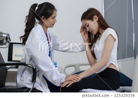 Stressed patient are treated by a psychologist or doctor in a psychiatric clinic. Patients reported symptoms of depression, stress, irritability, and life problems 125320356