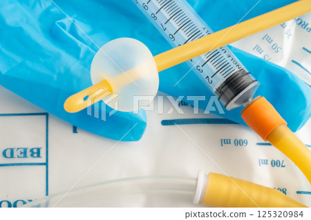 Foley catheter and urine drainage bag collect urine for disability or patient in hospital. 125320984
