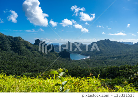 Stunning view of Hatiheu Bay and beach, Nuku Hiva, Marquesas Islands. French Polynesia Stunning view of Hatiheu Bay and beach, Nuku Hiva, Marquesas Islands. French Polynesia 125321525