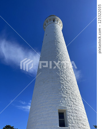 Izumo Hinomisaki Lighthouse (Shimane) shining against the blue sky 125322035
