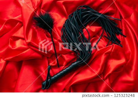 Whip and Fluffy Feathered on red background 125323248