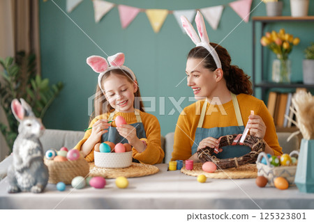 family preparing for Easter family preparing for Easter 125323801