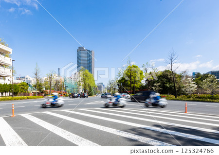 A police vehicle is seen at the intersection in front of Yotsuya Junior High School in Minato Ward, Tokyo. 125324766