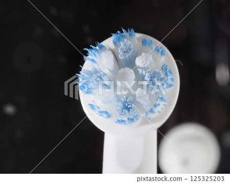 used electric rotating toothbrush head detail 125325203