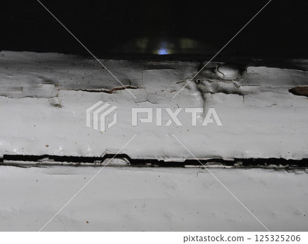 Cracked wood window detail close up 125325206