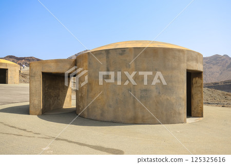 March 25 2025 Walking Near Deserted Bunkers in a Rocky Terrain, Japan 125325616