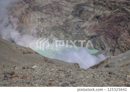 March 25 2025 Breathtaking Volcanic Crater with Steaming Lake and Rocky, Japan 125325642