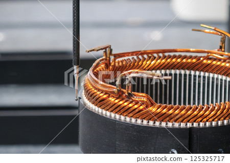 Close up scene the CMM machine working with the electric motor parts. 125325717