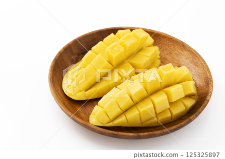 Thai mango on a wooden plate 125325897