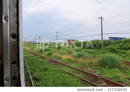 JR Hokkaido, Hakodate Main Line, local train window view from Yakumo Station to Oshamanbe Station (cloudy sky in summer 2023) JR Hokkaido, Hakodate Main Line, local train window view from Yakumo Station to Oshamanbe Station (cloudy sky in summer 2023) 125326630
