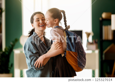 Happy family preparing for school Happy family preparing for school 125327014