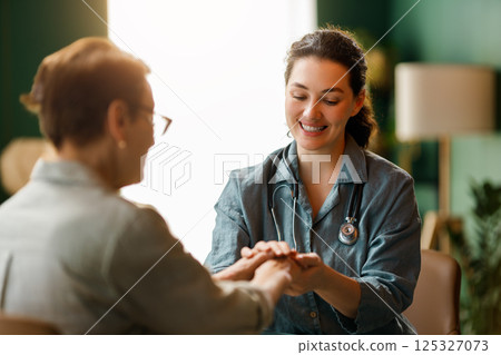patient and a doctor talking patient and a doctor talking 125327073