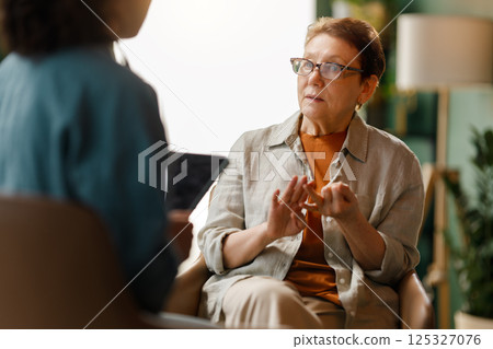 patient and a doctor talking patient and a doctor talking 125327076