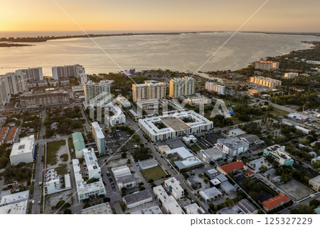 Sarasota, Florida at sunset. USA travel destination. American city downtown architecture with high-rise office buildings. Real estate development in Florida Sarasota, Florida at sunset. USA travel destination. American city downtown architecture with high-rise office buildings. Real estate development in Florida 125327229
