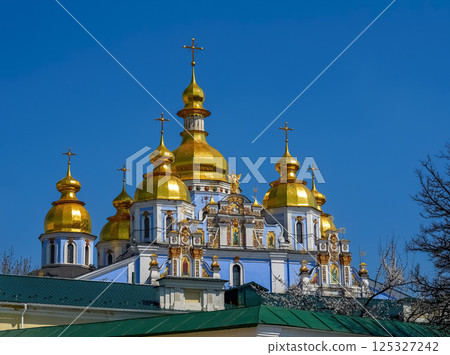Orthodox Christian Cathedral with golden domes and crosses, St. Michael's Golden-domed Cathedral. Kyiv. Ukraine Orthodox Christian Cathedral with golden domes and crosses, St. Michael's Golden-domed Cathedral. Kyiv. Ukraine 125327242