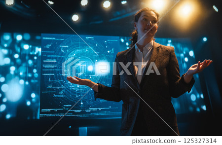 A woman is speaking on stage 125327314