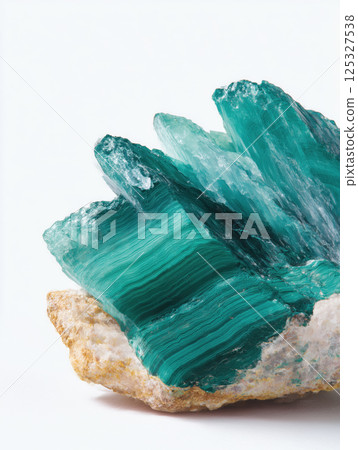 Natural malachite surface with radial green patterns and polished mineral texture. Studio lighting macro photography. Geology and semi-precious stone concept. Design for banner, print, wallpaper, 125327538