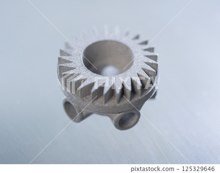Metal object printed on 3D printer from metal powder. Model created on 3D printer from metal powder. Metal Jet technology. New modern 3D printing technologies. Additive progressive technology. Concept 125329646