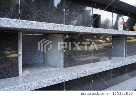 Family columbarium for burial of urns with ashes or coffins European cemetery with graves Family columbarium for burial of urns with ashes or coffins European cemetery with graves 125331036