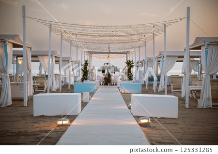 Beach Wedding Venue with Elegant And Romantic Setup 125331285