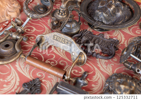 Vintage Door Knockers and Decorative Metal Signs Vintage Door Knockers and Decorative Metal Signs 125332711