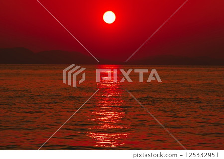 Sunset over the sea Sunset over the sea 125332951