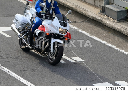 Image of a police motorcycle on patrol Image of a police motorcycle on patrol 125332976