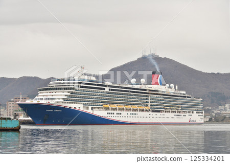 Photographing the cruise ship Carnival Luminosa calling at Hakodate Port in spring in Hakodate, Hokkaido 125334201