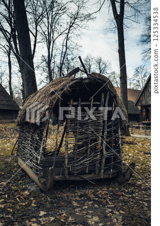 old wooden prison on sled.  125334538