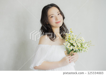Young woman in a wedding dress Young woman in a wedding dress 125334883