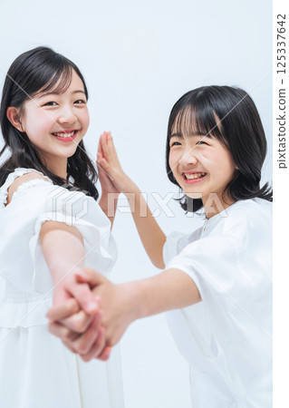 Portrait of close sisters Portrait of close sisters 125337642