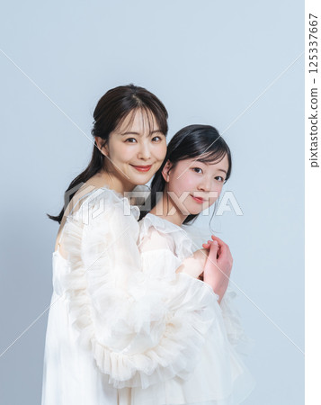 Mother and daughter portrait Mother and daughter portrait 125337667