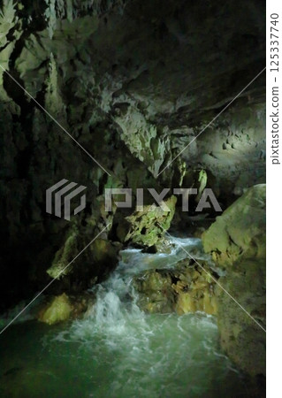 A view of the river flowing through the Akiyoshi Cave A view of the river flowing through the Akiyoshi Cave 125337740