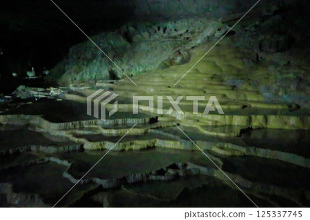 The 100 plates in Akiyoshi Cave formed from groundwater that has solidified over many years The 100 plates in Akiyoshi Cave formed from groundwater that has solidified over many years 125337745