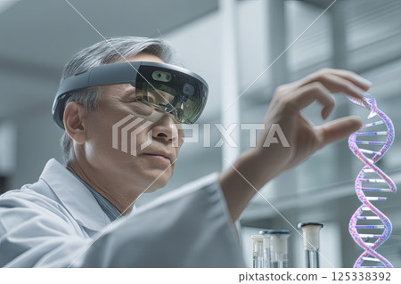 Male scientist wearing an AR headset interacting with a holographic DNA structure. The scientist interacts with a holographic DNA strand, illustrating the future of genetic exploration. 125338392