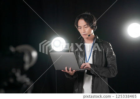 Man giving instructions on stage 125338465