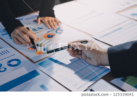 Business analyze,Close up Business people meeting to discuss the situation on the market. Business Financial Concept Business analyze,Close up Business people meeting to discuss the situation on the market. Business Financial Concept 125339041