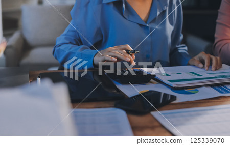 Business analyze,Close up Business people meeting to discuss the situation on the market. Business Financial Concept Business analyze,Close up Business people meeting to discuss the situation on the market. Business Financial Concept 125339070