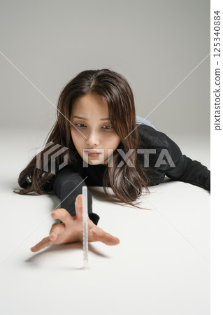 A young man in his 20s addicted to various drugs and drugs 125340884