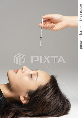 A young man in his 20s addicted to various drugs and drugs 125340886