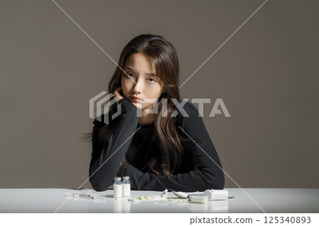 A young man in his 20s addicted to various drugs and drugs 125340893