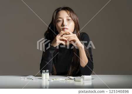 A young man in his 20s addicted to various drugs and drugs 125340896