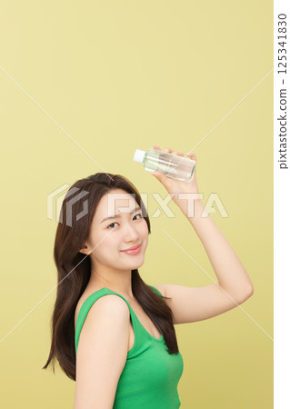 A pretty woman holding eco-friendly basic cosmetics 125341830
