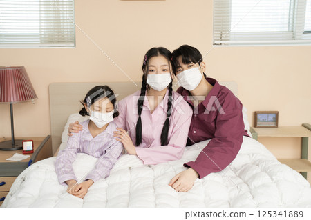 Parents watching their child learn from behind Parents watching their child learn from behind 125341889