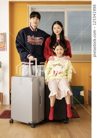 A young family playing games together 125341998