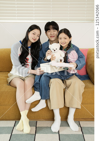 Parents nursing their sick child Parents nursing their sick child 125342066